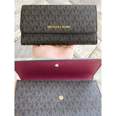 michael michael kors large studded trifold wallet|Michael Kors oversized wallet.